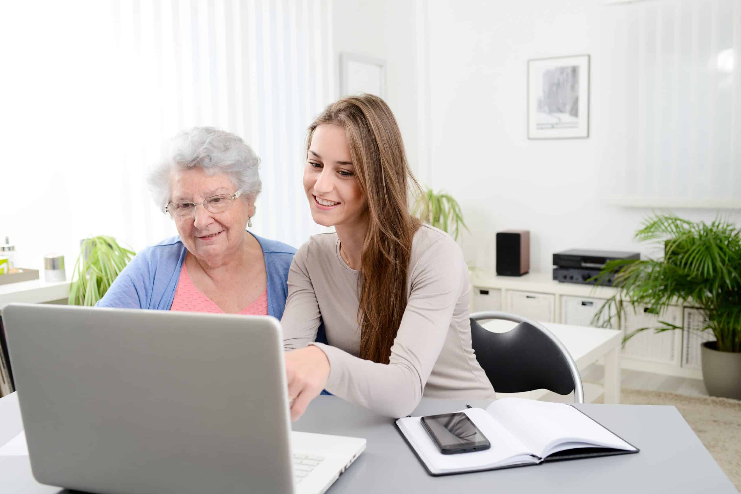 young person helping older woman cognitive therapy scaled