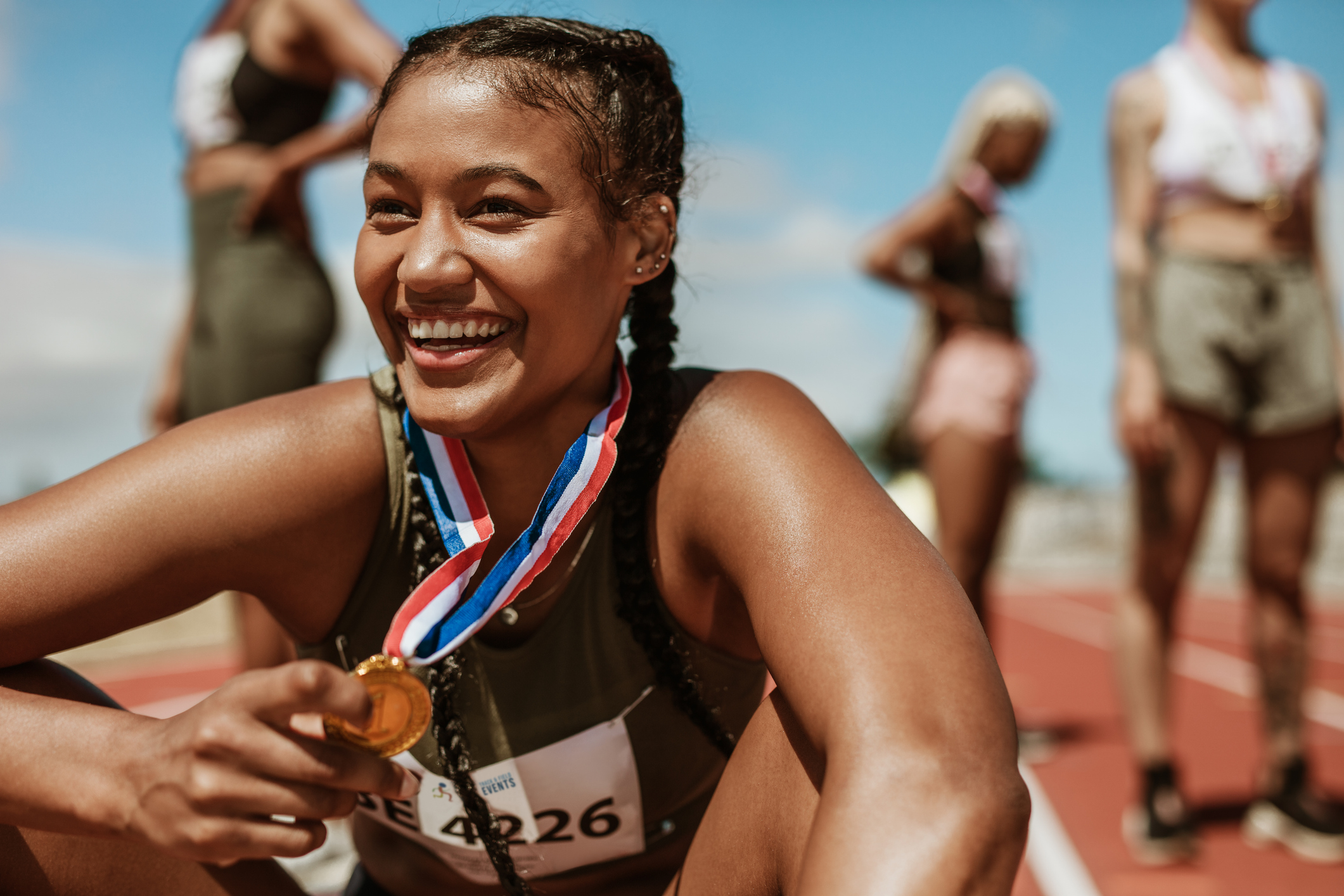 Running race winner in track